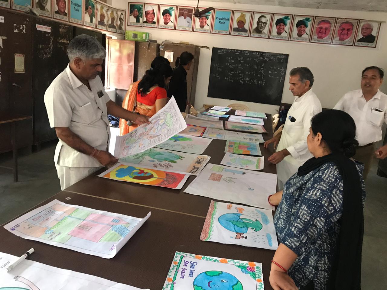 POSTER MAKING COMPETITION & DONATION OF CEILING FANS AT GSSS PALHAWAS