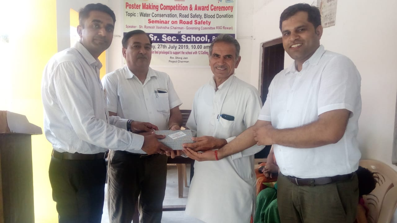 POSTER MAKING COMPETITION & DONATION OF CEILING FANS AT GSSS PALHAWAS