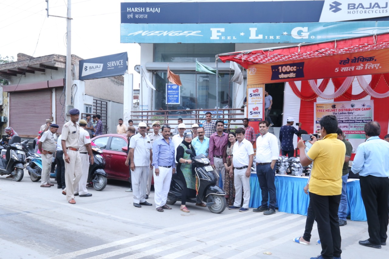 Road Safety Awareness & Helmet Distribution Camp for Ladies.