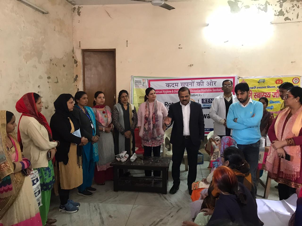 SANITARY PADS DISTRIBUTION TO LADIES DURING HEALTH CAMP