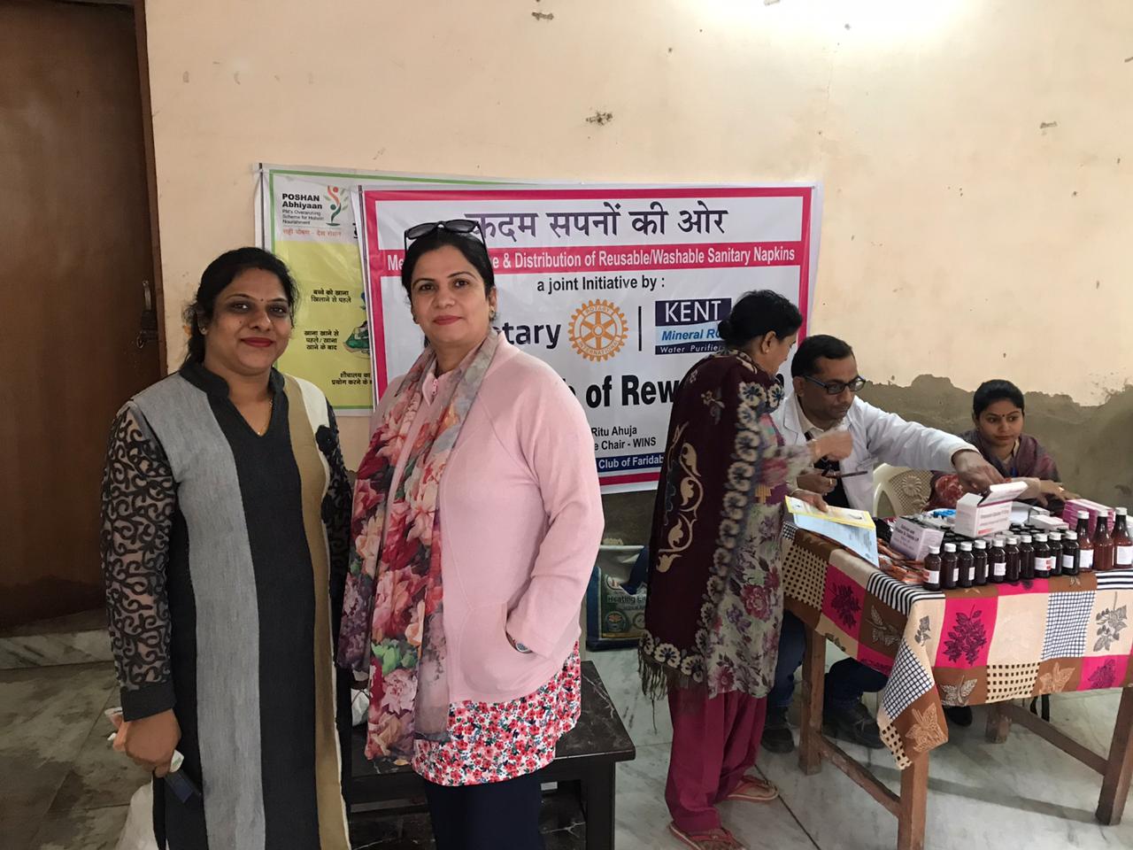 SANITARY PADS DISTRIBUTION TO LADIES DURING HEALTH CAMP