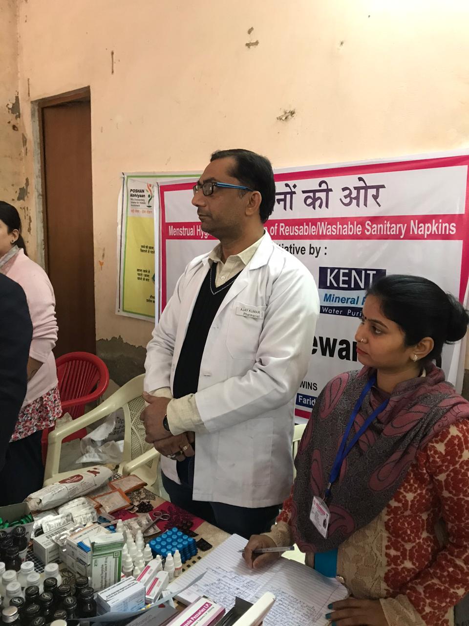 SANITARY PADS DISTRIBUTION TO LADIES DURING HEALTH CAMP