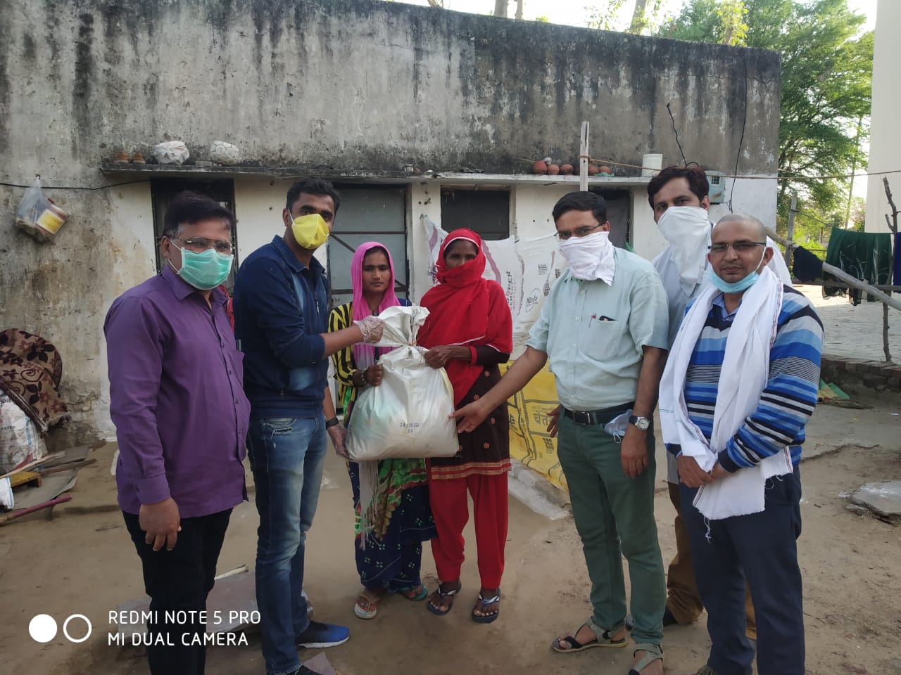 DISTRIBUTION OF FOOD KITS TO LESS PREVILEDGD FAMILIES OF REWARI