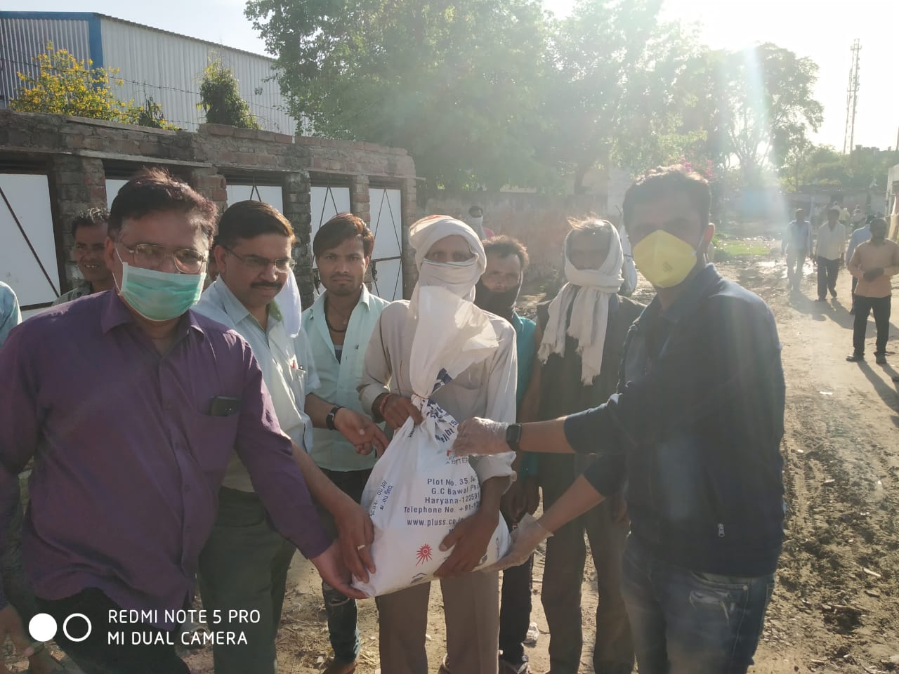 DISTRIBUTION OF FOOD KITS TO LESS PREVILEDGD FAMILIES OF REWARI