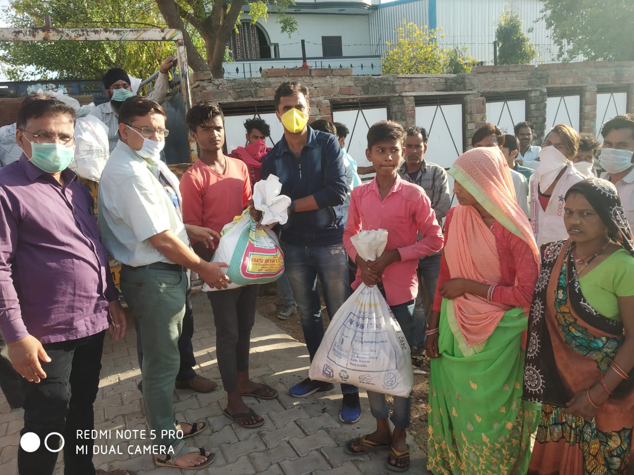 DISTRIBUTION OF FOOD KITS TO LESS PREVILEDGD FAMILIES OF REWARI