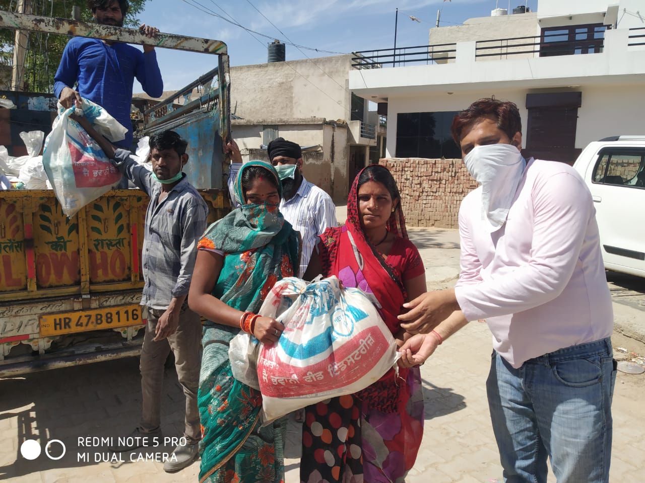 2ND DAY DISTRIBUTION OF FOOD KITS TO LESS PREVILEDGD FAMILIES OF REWARI