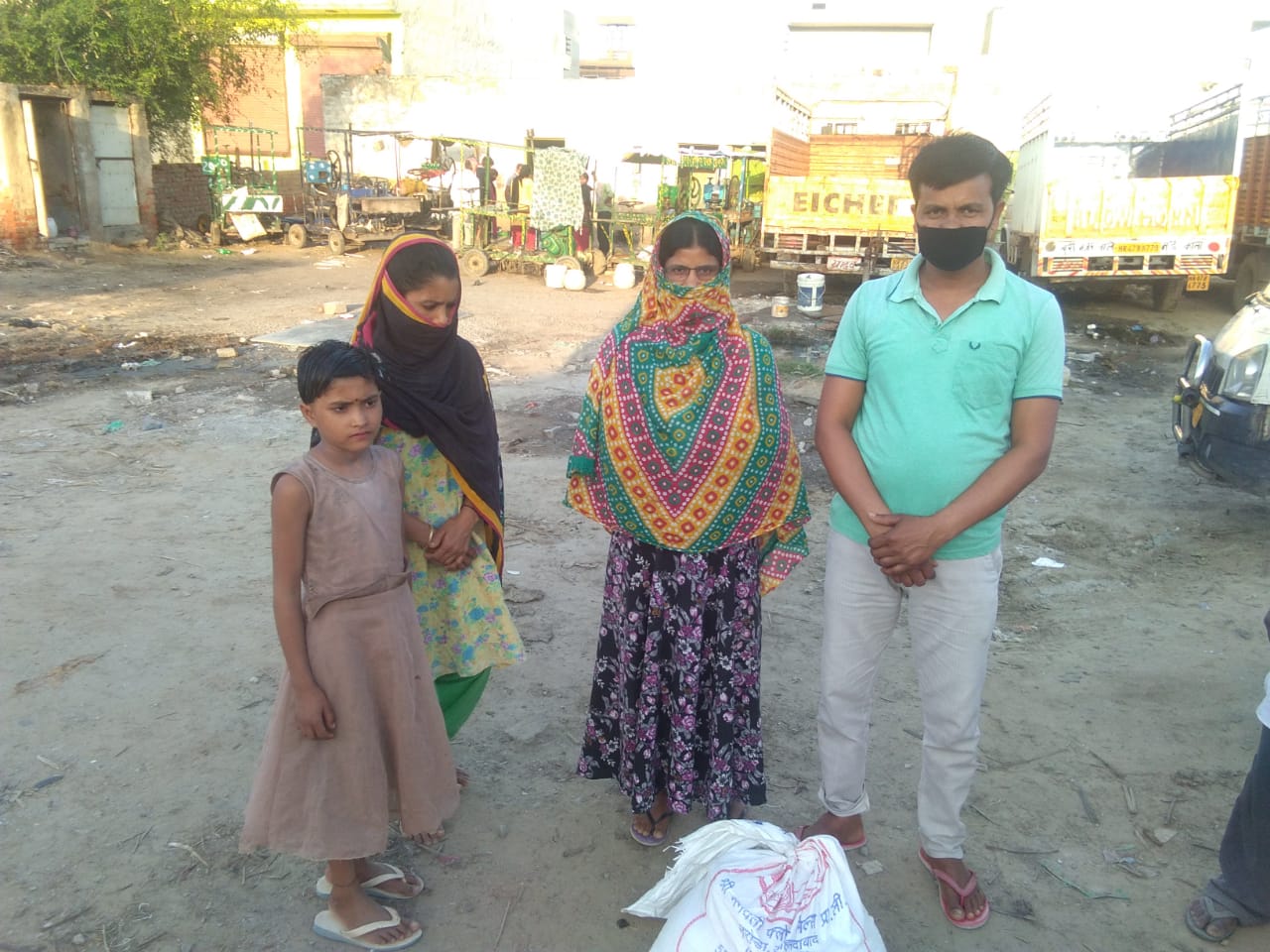 DAY -3 DISTRIBUTION OF FOOD KITS TO LESS PREVILEDGD FAMILIES OF REWARI