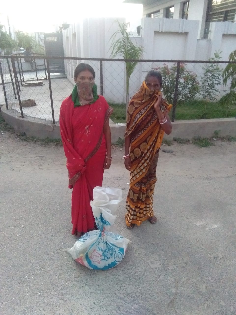 DAY -3 DISTRIBUTION OF FOOD KITS TO LESS PREVILEDGD FAMILIES OF REWARI