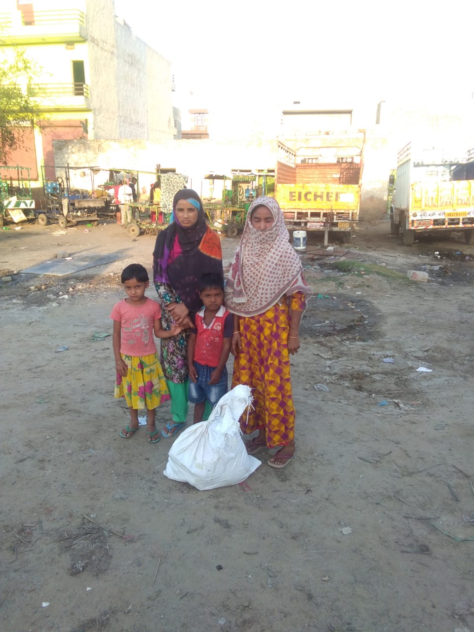 DAY -3 DISTRIBUTION OF FOOD KITS TO LESS PREVILEDGD FAMILIES OF REWARI