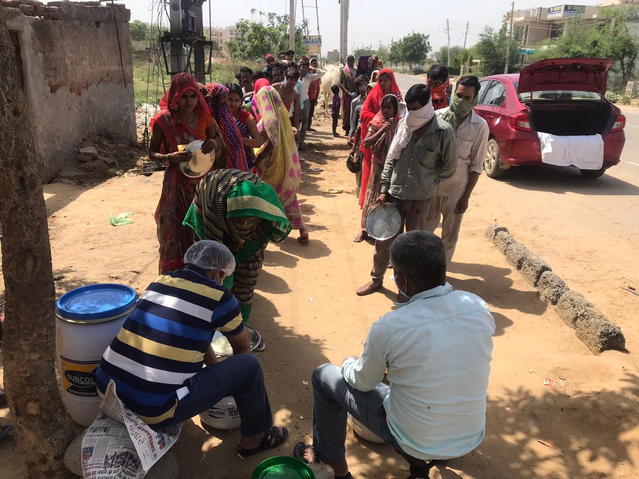 DISTRIBUTION OF FOOD TO LESS PREVILEDGD FAMILIES OF REWARI